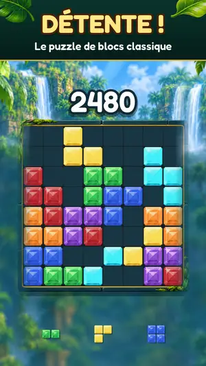 Gem Bash Classique : le plateau 8×8 dans la jungle avec des blocs de pierres précieuses et le score, titre « Détente ! Le puzzle de blocs classique »